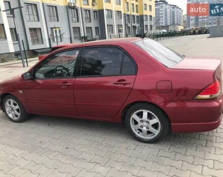 Красный Мицубиси Лансер, объемом двигателя 1.6 л и пробегом 224 тыс. км за 5500 $, фото 3 на Automoto.ua
