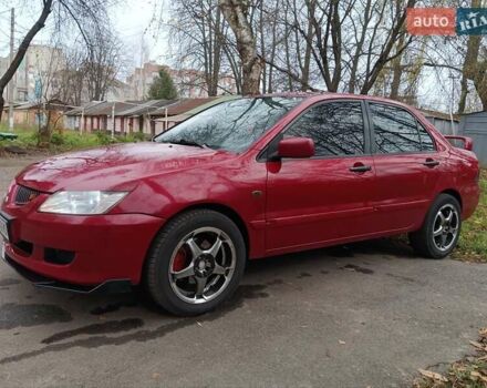 Червоний Міцубісі Lancer, об'ємом двигуна 1.3 л та пробігом 223 тис. км за 4250 $, фото 17 на Automoto.ua