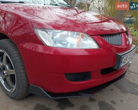 Червоний Міцубісі Lancer, об'ємом двигуна 1.3 л та пробігом 223 тис. км за 4250 $, фото 6 на Automoto.ua