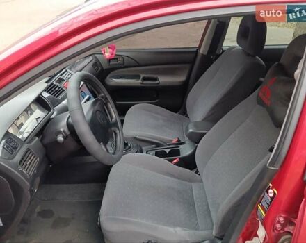 Червоний Міцубісі Lancer, об'ємом двигуна 1.3 л та пробігом 223 тис. км за 4250 $, фото 24 на Automoto.ua