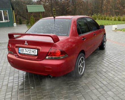 Червоний Міцубісі Lancer, об'ємом двигуна 1.58 л та пробігом 350 тис. км за 3600 $, фото 2 на Automoto.ua