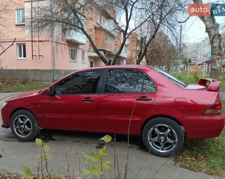Червоний Міцубісі Lancer, об'ємом двигуна 1.3 л та пробігом 223 тис. км за 4250 $, фото 15 на Automoto.ua