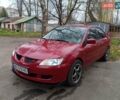 Червоний Міцубісі Lancer, об'ємом двигуна 1.3 л та пробігом 223 тис. км за 4250 $, фото 4 на Automoto.ua