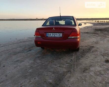 Червоний Міцубісі Lancer, об'ємом двигуна 1.58 л та пробігом 200 тис. км за 3400 $, фото 5 на Automoto.ua