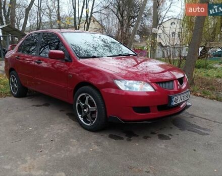 Червоний Міцубісі Lancer, об'ємом двигуна 1.3 л та пробігом 223 тис. км за 4250 $, фото 1 на Automoto.ua