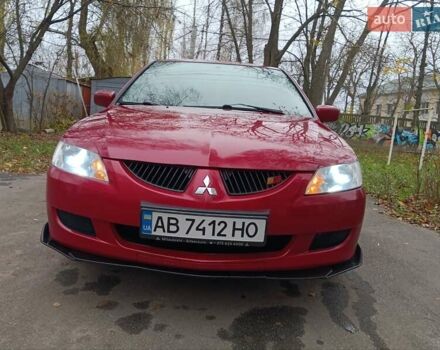 Червоний Міцубісі Lancer, об'ємом двигуна 1.3 л та пробігом 223 тис. км за 4250 $, фото 18 на Automoto.ua
