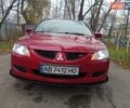 Червоний Міцубісі Lancer, об'ємом двигуна 1.3 л та пробігом 223 тис. км за 4250 $, фото 18 на Automoto.ua