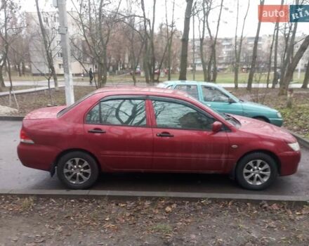 Червоний Міцубісі Lancer, об'ємом двигуна 1.3 л та пробігом 250 тис. км за 4300 $, фото 6 на Automoto.ua