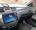 Червоний Міцубісі Lancer, об'ємом двигуна 1.3 л та пробігом 223 тис. км за 4250 $, фото 22 на Automoto.ua