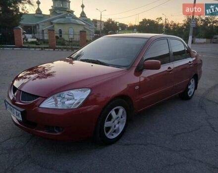 Красный Мицубиси Лансер, объемом двигателя 1.58 л и пробегом 250 тыс. км за 2999 $, фото 9 на Automoto.ua