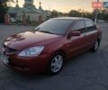 Красный Мицубиси Лансер, объемом двигателя 1.58 л и пробегом 250 тыс. км за 2999 $, фото 9 на Automoto.ua