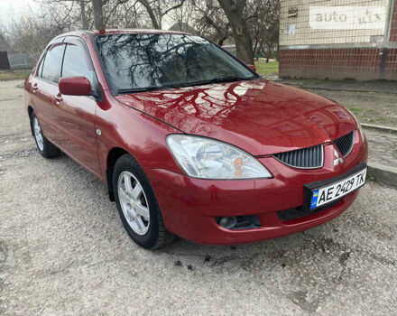Червоний Міцубісі Lancer, об'ємом двигуна 1.6 л та пробігом 310 тис. км за 4500 $, фото 3 на Automoto.ua
