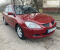 Червоний Міцубісі Lancer, об'ємом двигуна 1.6 л та пробігом 310 тис. км за 4500 $, фото 3 на Automoto.ua