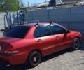 Червоний Міцубісі Lancer, об'ємом двигуна 1 л та пробігом 280 тис. км за 5500 $, фото 1 на Automoto.ua