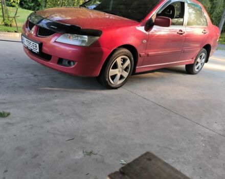 Красный Мицубиси Лансер, объемом двигателя 1 л и пробегом 2 тыс. км за 3100 $, фото 7 на Automoto.ua