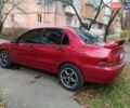 Червоний Міцубісі Lancer, об'ємом двигуна 1.3 л та пробігом 223 тис. км за 4250 $, фото 16 на Automoto.ua