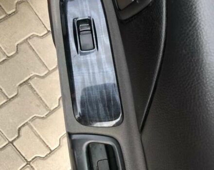 Красный Мицубиси Лансер, объемом двигателя 1.6 л и пробегом 224 тыс. км за 5500 $, фото 12 на Automoto.ua