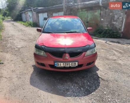 Красный Мицубиси Лансер, объемом двигателя 1.6 л и пробегом 400 тыс. км за 3100 $, фото 3 на Automoto.ua