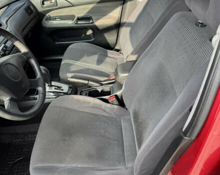 Червоний Міцубісі Lancer, об'ємом двигуна 1.58 л та пробігом 271 тис. км за 4100 $, фото 7 на Automoto.ua