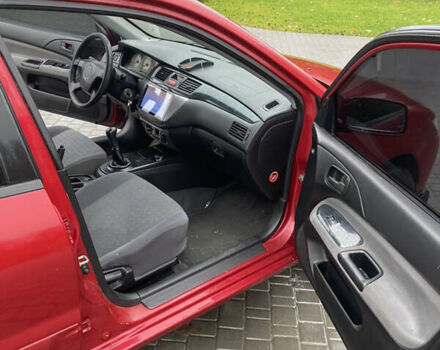 Червоний Міцубісі Lancer, об'ємом двигуна 1.58 л та пробігом 350 тис. км за 3600 $, фото 8 на Automoto.ua