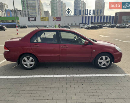 Червоний Міцубісі Lancer, об'ємом двигуна 1.58 л та пробігом 271 тис. км за 4100 $, фото 5 на Automoto.ua