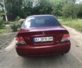 Червоний Міцубісі Lancer, об'ємом двигуна 1.3 л та пробігом 177 тис. км за 4200 $, фото 2 на Automoto.ua