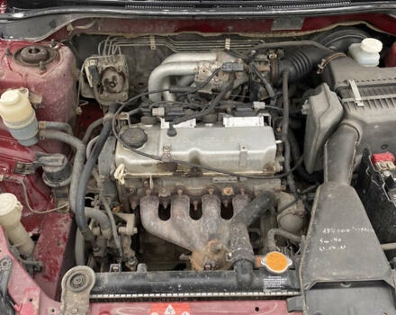 Червоний Міцубісі Lancer, об'ємом двигуна 1.58 л та пробігом 350 тис. км за 3600 $, фото 10 на Automoto.ua