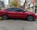 Червоний Міцубісі Lancer, об'ємом двигуна 1.3 л та пробігом 223 тис. км за 4250 $, фото 11 на Automoto.ua