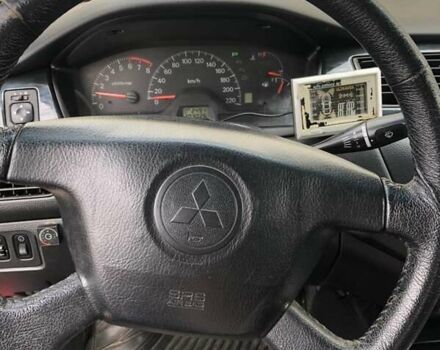 Красный Мицубиси Лансер, объемом двигателя 1.6 л и пробегом 224 тыс. км за 5500 $, фото 11 на Automoto.ua