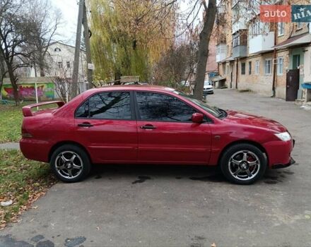 Червоний Міцубісі Lancer, об'ємом двигуна 1.3 л та пробігом 223 тис. км за 4250 $, фото 10 на Automoto.ua