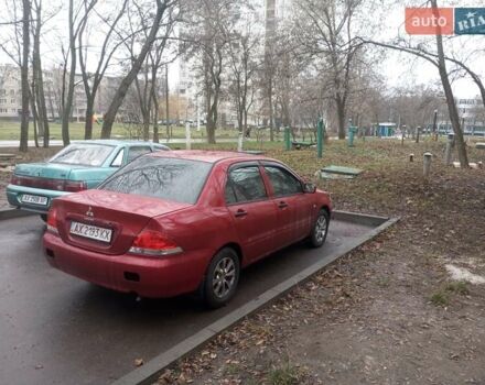 Червоний Міцубісі Lancer, об'ємом двигуна 1.3 л та пробігом 250 тис. км за 4300 $, фото 1 на Automoto.ua