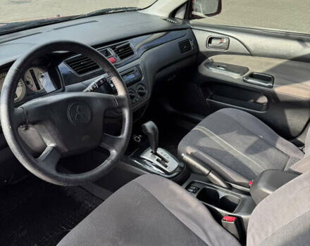 Червоний Міцубісі Lancer, об'ємом двигуна 1.58 л та пробігом 271 тис. км за 4100 $, фото 6 на Automoto.ua