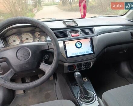 Червоний Міцубісі Lancer, об'ємом двигуна 1.3 л та пробігом 223 тис. км за 4250 $, фото 27 на Automoto.ua