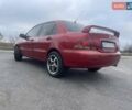 Красный Мицубиси Лансер, объемом двигателя 1.3 л и пробегом 250 тыс. км за 3450 $, фото 2 на Automoto.ua
