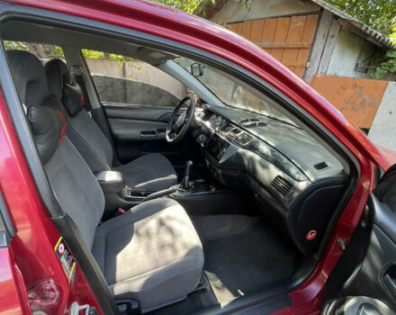 Червоний Міцубісі Lancer, об'ємом двигуна 1.3 л та пробігом 219 тис. км за 3600 $, фото 5 на Automoto.ua