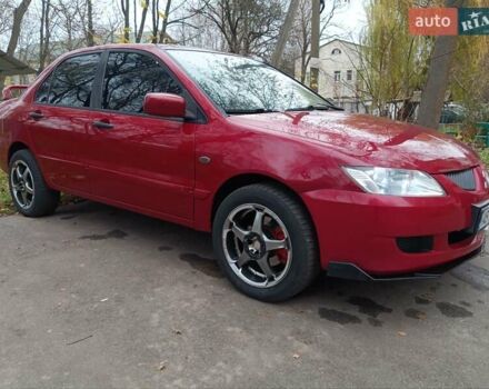 Червоний Міцубісі Lancer, об'ємом двигуна 1.3 л та пробігом 223 тис. км за 4250 $, фото 8 на Automoto.ua
