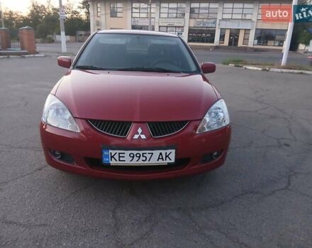Красный Мицубиси Лансер, объемом двигателя 1.58 л и пробегом 250 тыс. км за 2999 $, фото 6 на Automoto.ua