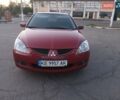 Красный Мицубиси Лансер, объемом двигателя 1.58 л и пробегом 250 тыс. км за 2999 $, фото 6 на Automoto.ua