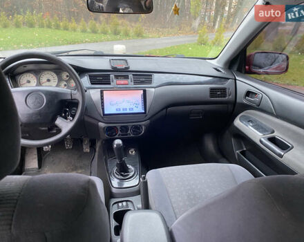 Червоний Міцубісі Lancer, об'ємом двигуна 1.58 л та пробігом 350 тис. км за 3600 $, фото 6 на Automoto.ua
