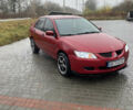 Червоний Міцубісі Lancer, об'ємом двигуна 1.58 л та пробігом 350 тис. км за 3600 $, фото 1 на Automoto.ua