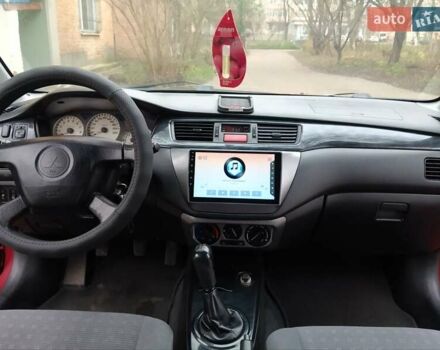 Червоний Міцубісі Lancer, об'ємом двигуна 1.3 л та пробігом 223 тис. км за 4250 $, фото 29 на Automoto.ua
