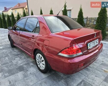 Червоний Міцубісі Lancer, об'ємом двигуна 1.6 л та пробігом 249 тис. км за 5200 $, фото 4 на Automoto.ua