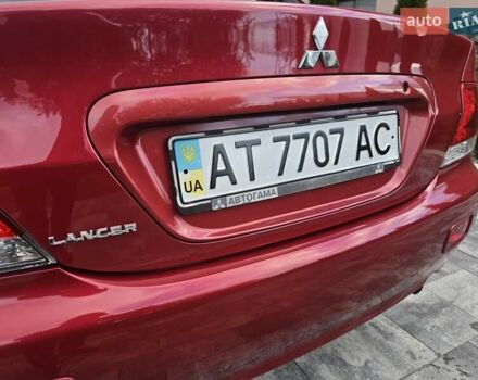Червоний Міцубісі Lancer, об'ємом двигуна 1.6 л та пробігом 249 тис. км за 5200 $, фото 38 на Automoto.ua