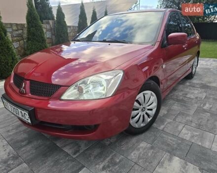 Червоний Міцубісі Lancer, об'ємом двигуна 1.6 л та пробігом 249 тис. км за 5200 $, фото 53 на Automoto.ua