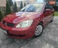 Червоний Міцубісі Lancer, об'ємом двигуна 1.6 л та пробігом 249 тис. км за 5200 $, фото 53 на Automoto.ua
