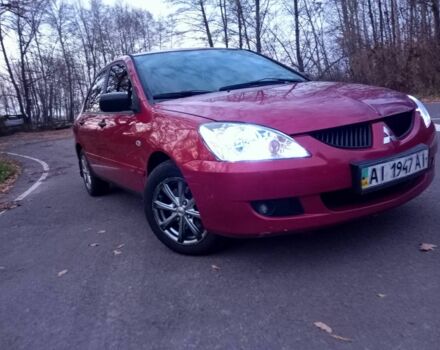 Красный Мицубиси Лансер, объемом двигателя 1.6 л и пробегом 450 тыс. км за 2850 $, фото 2 на Automoto.ua