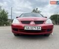 Красный Мицубиси Лансер, объемом двигателя 1.58 л и пробегом 250 тыс. км за 3999 $, фото 4 на Automoto.ua