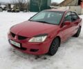 Червоний Міцубісі Lancer, об'ємом двигуна 1.58 л та пробігом 400 тис. км за 3500 $, фото 1 на Automoto.ua