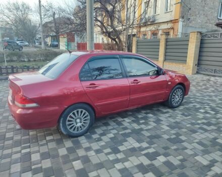 Червоний Міцубісі Lancer, об'ємом двигуна 1.6 л та пробігом 280 тис. км за 3500 $, фото 4 на Automoto.ua