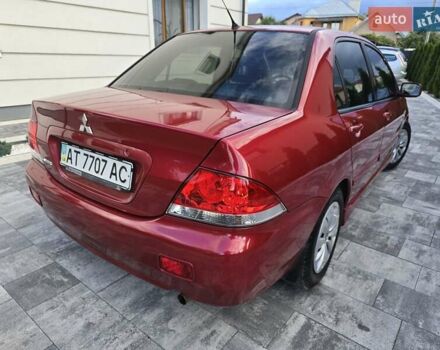 Червоний Міцубісі Lancer, об'ємом двигуна 1.6 л та пробігом 249 тис. км за 5200 $, фото 6 на Automoto.ua